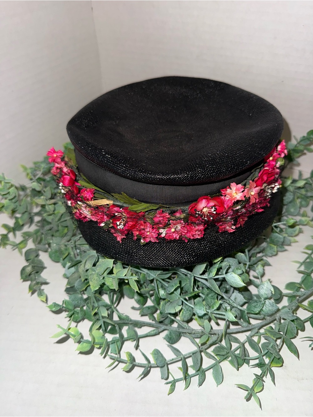 straw millinery hat with floral embellishment, size 22